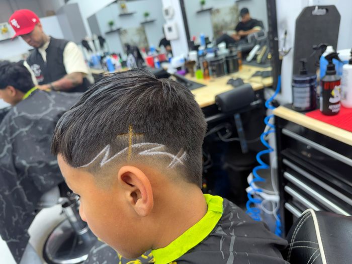 Kid's haircut with a shaved design